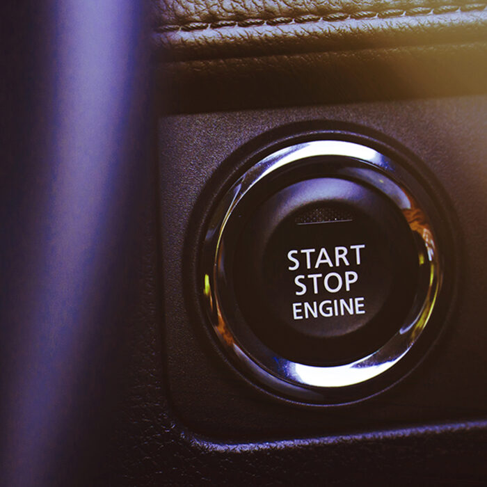 A stop/start engine button.